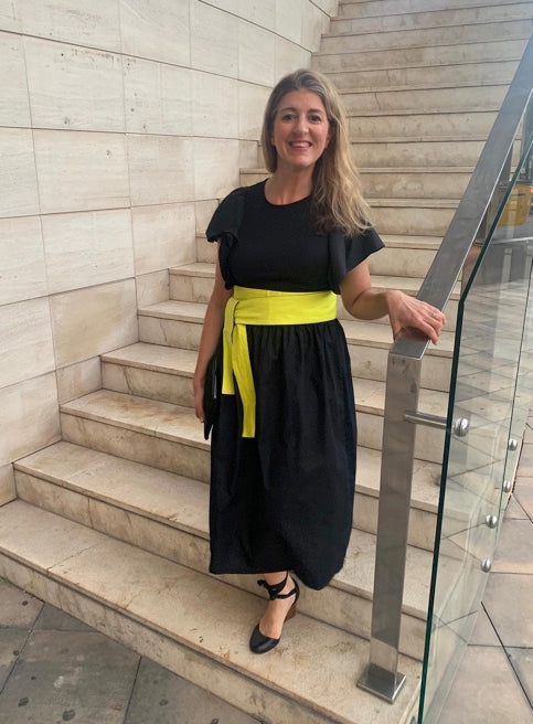 Bright Yellow Obi Belt worn on a black dress.